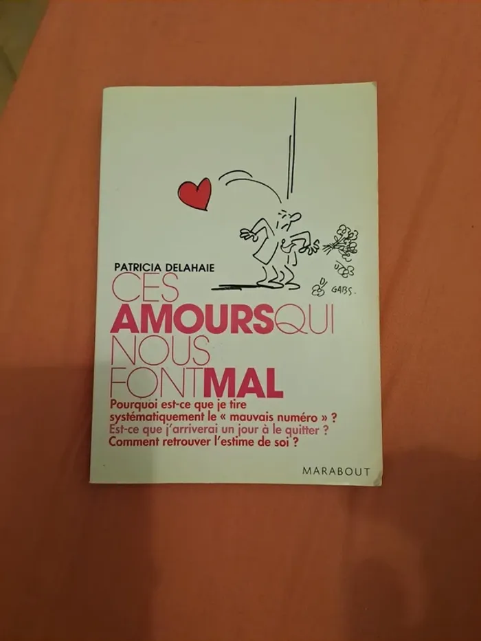 Livre c'est amours qui nous font du mal - photo numéro 1