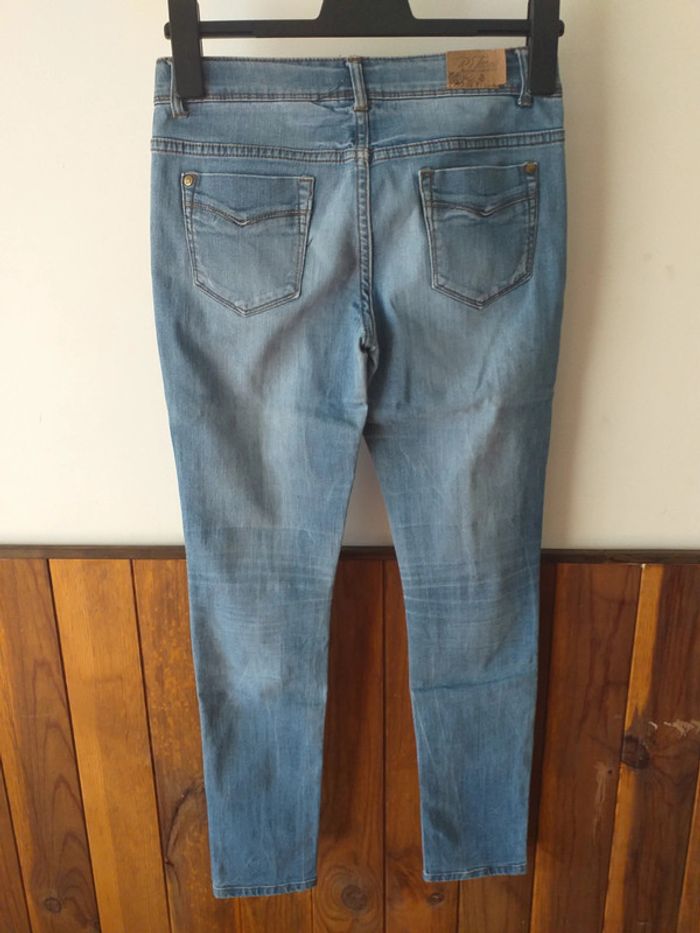 Jeans bleu effet troué - photo numéro 2