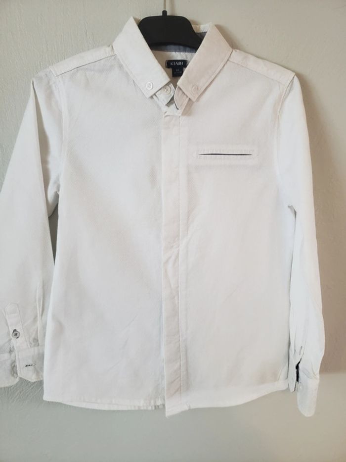 Chemise neuf jamais portée 8 ans