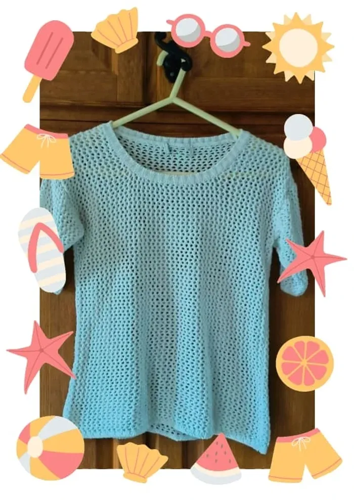 Pull en mailles ajourées