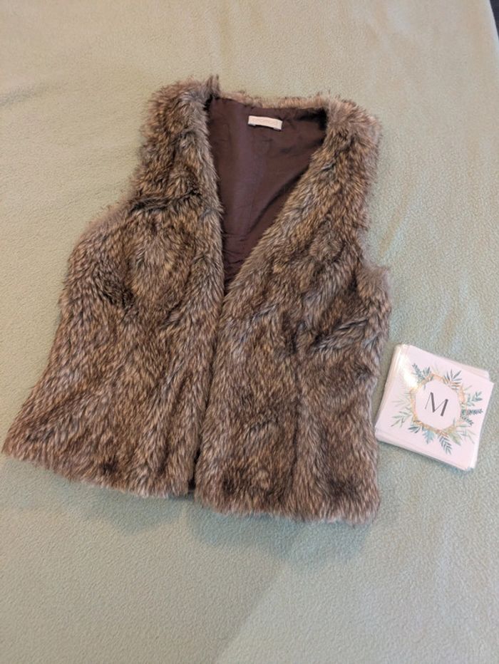 Gilet sans manche fausse fourrure 38