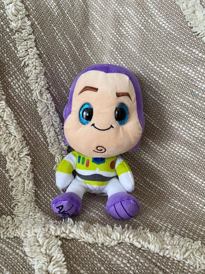 Peluche doudou 18cm Disney Toy story buzz l’eclair astronaute violet blanc vert très bon état