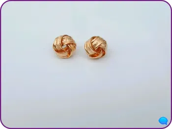 Boucles d’oreilles nœud doré – style chic intemporel