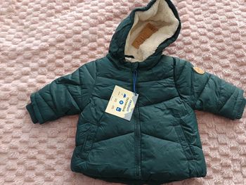 Doudoune fourré neuf 6m tao