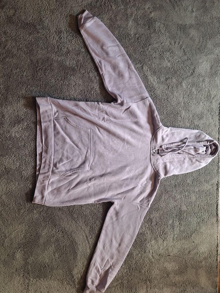 Pull a capuche rose pâle