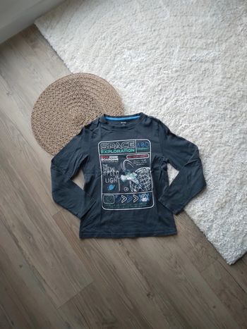 🌸Tee-shirt bleu avec imprimé sur l'espace 10ans a 1€🌸