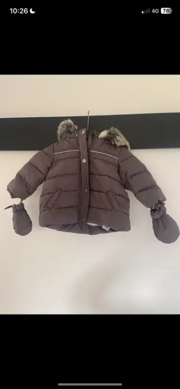 Manteau fourré bébé fille .