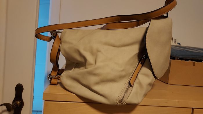 Sac écru peu se porter à dos et à l épaule également