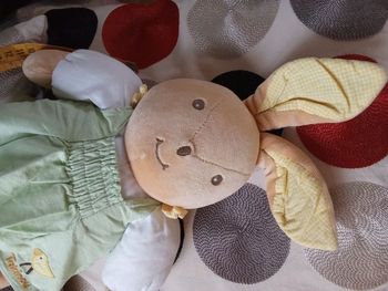 Doudou Takinou lapin lapine lapereau beige marron clair robe verte clair en posture debout modèle vintage ancien joli  peluche doudou D'occasion
