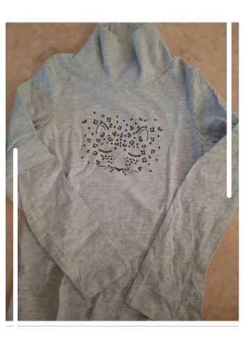 Col roulé neuf 8 ans