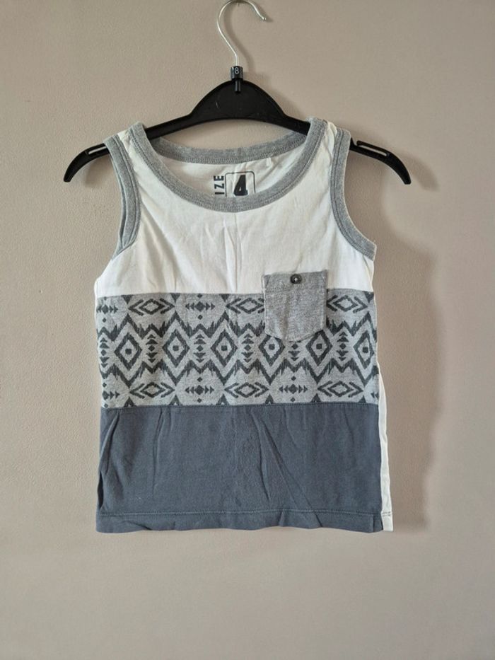 Débardeur 4 ans très bon état quasi neuf