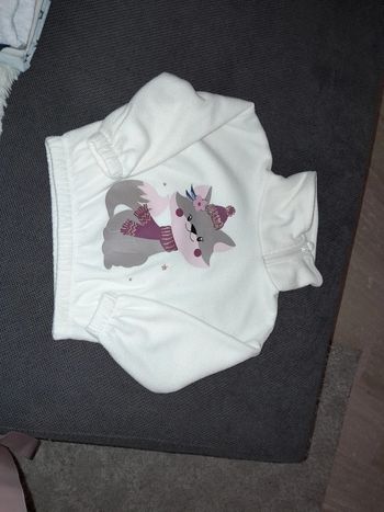 Pull beige petit chat, col zippé