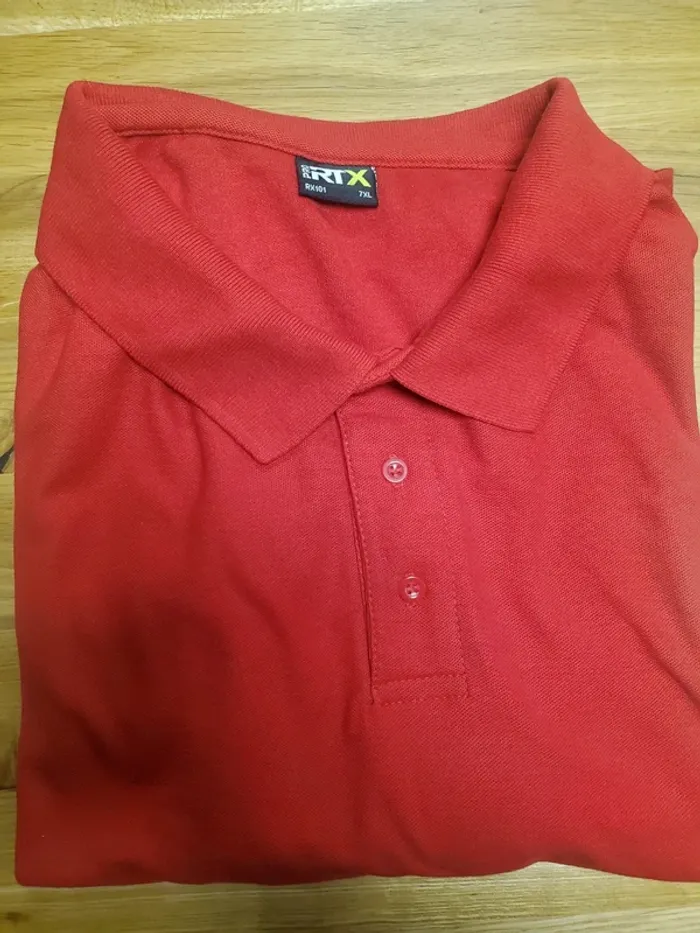 Polo neuf . Grande taille 7xl.