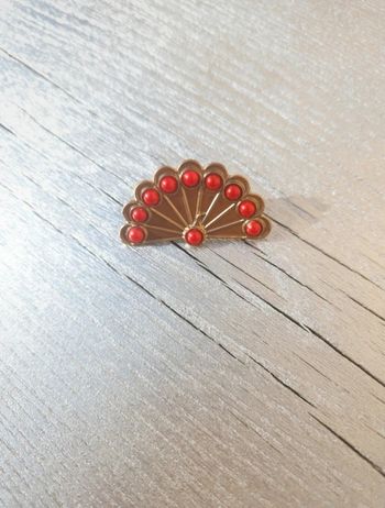 Pim's paon doré et rouge artisanal