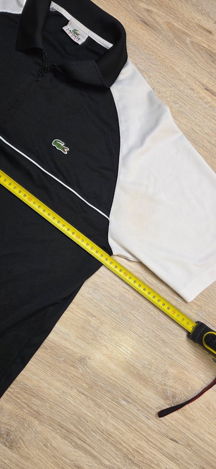 Polo Lacoste taille 5 / L noir et blanc Très bon état - photo numéro 9