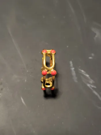 Bague acier inoxydable ajustable trait et points oranges