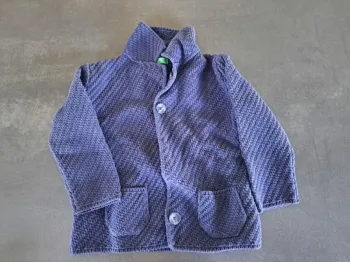 gilet bleu beneton 1 an