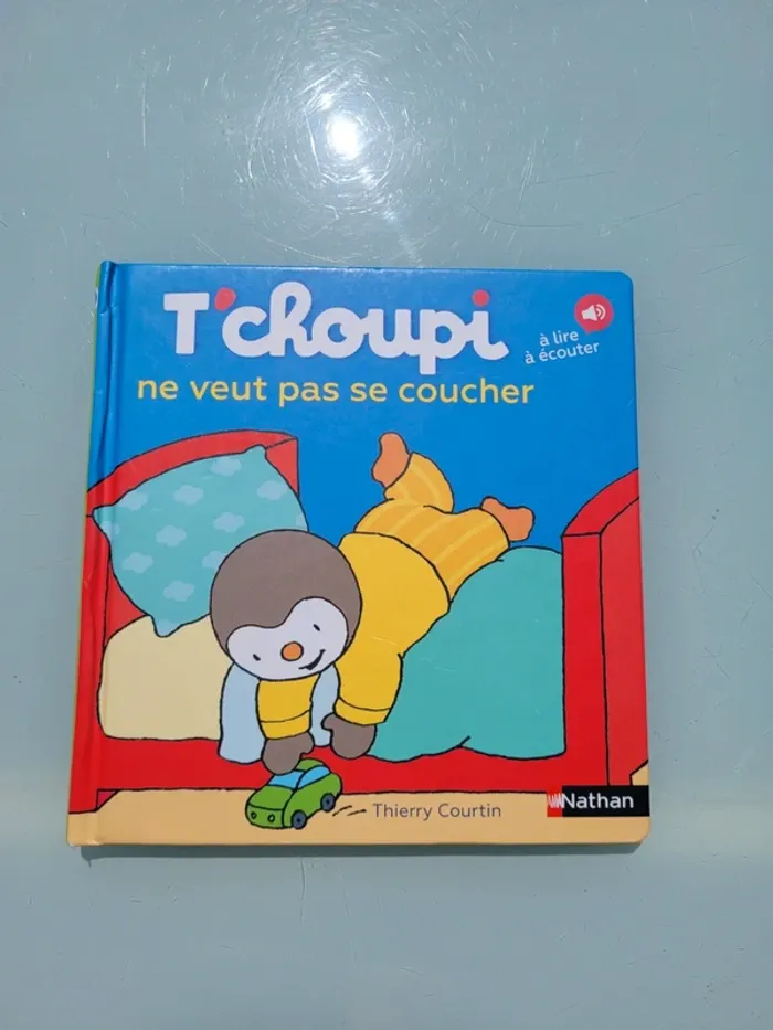 Livre T'choupi : à lire et à écouter, tome 39 : T'choupi ne veut pas se coucher (82) - photo numéro 2