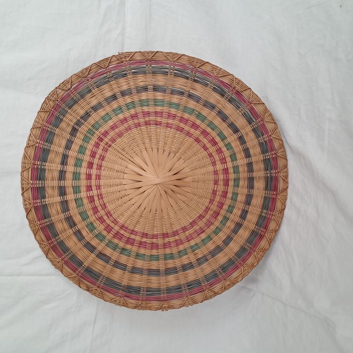 Décoration ronde murale en rotin osier multicolores du Laos