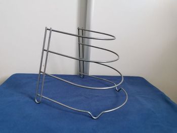 Rangement pour poêle 4 niveaux