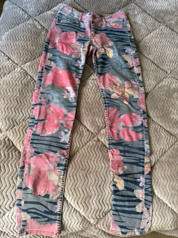 Pantalon jean fleuri/fleurs DDP en très bon état taille 36/38
