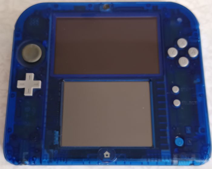 Nintendo 2 DS Bleu Crystal Transparent Seule avec stylet et une carte SD 4 Go