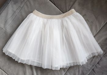 Jupe plissée tape à l'œil