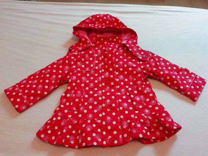 Manteau de pluie rouge orchestra 6 mois fille.
