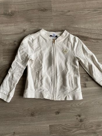 Gilet à fermeture éclair blanc avec des pois dorés taille 6 ans  Okaidi