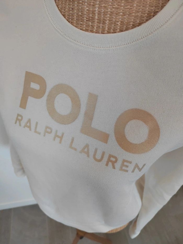 Sweat fille crème et doré Polo Ralph Lauren
Taille 155 / 159 cm
Excellent état - photo numéro 2