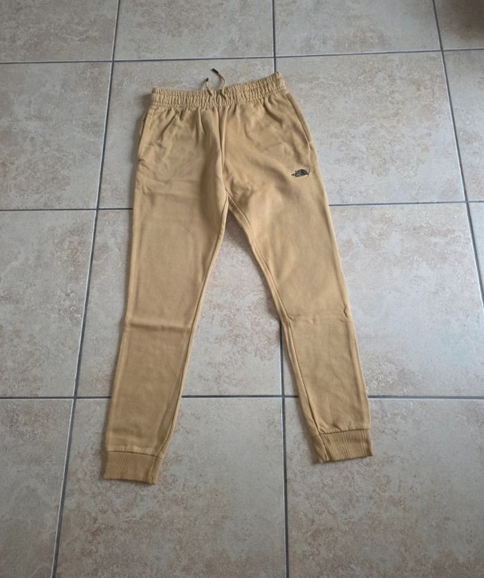 Jogging jaune the north face