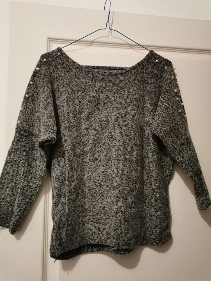 Pull avec perle