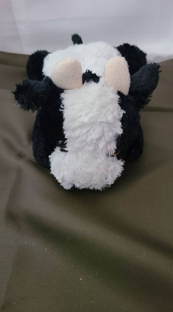 doudou peluche vache noire et blanche