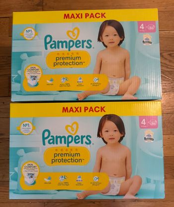2 cartons de couches Pampers taille 4