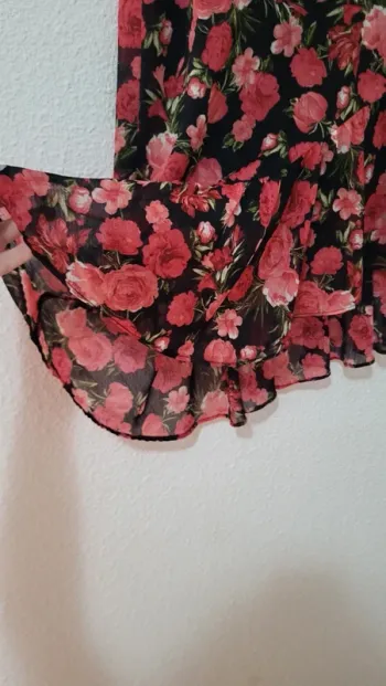 Falda midi fluida con volantes flora