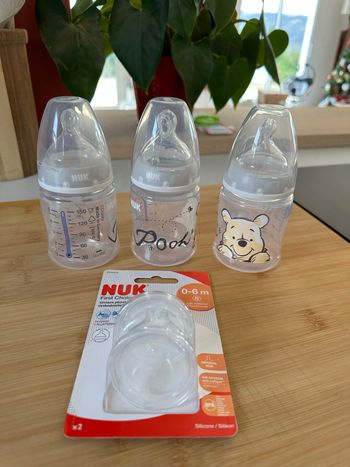 3 biberons NUK + tétines neuves