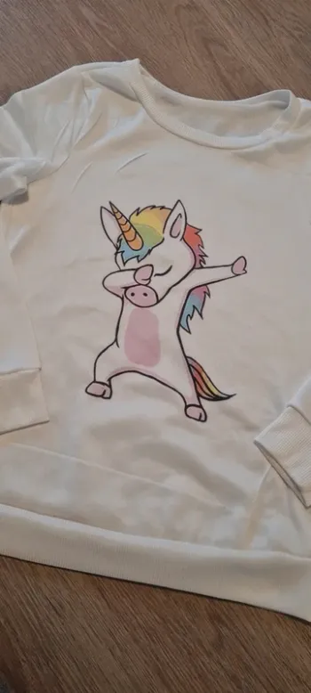 Pull licorne taille S