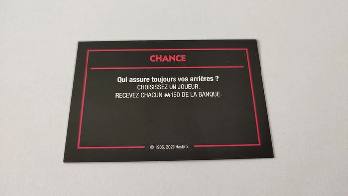 Carte Chance Assure vos arrières jeu de société Monopoly mauvais perdants Hasbro Gaming #B77