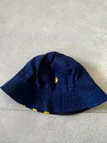 Bob réversible bleu et jaune JWanderson, très bon état, taille unique
