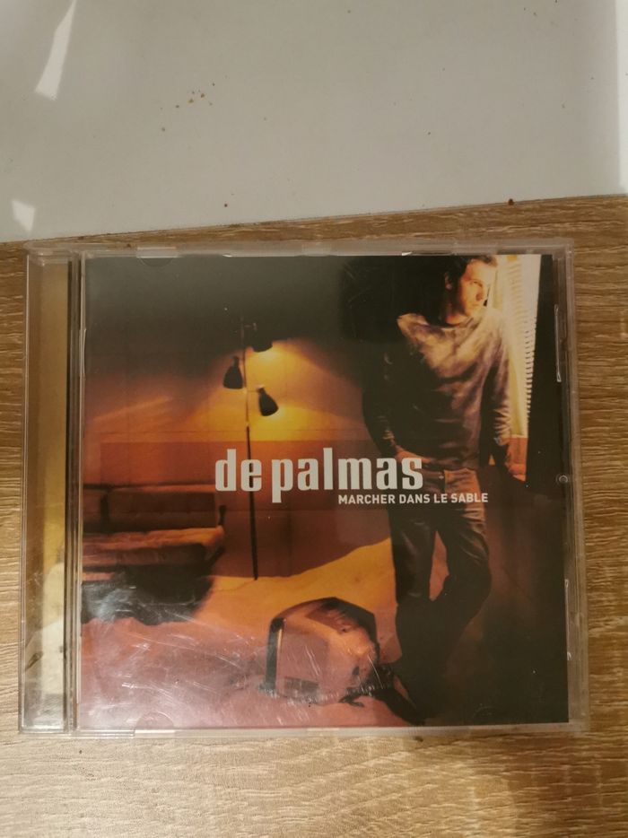 CD De palmas. Marcher dans le sable