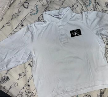Polo manches longues Calvin Klein Jeans 4-5 ans excellent état