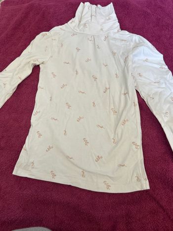 Col roulé blanc motifs beige 