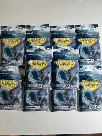 10 x paquets de 100 sleeves perfect fit Dragon Shield
