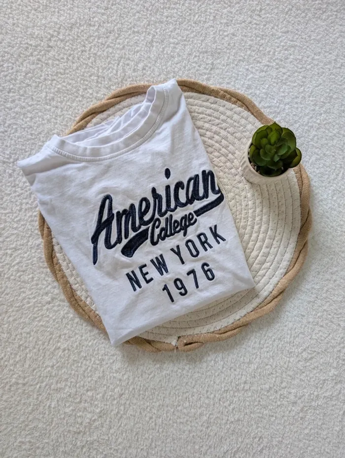 đ T-shirt American College â 12 ans
