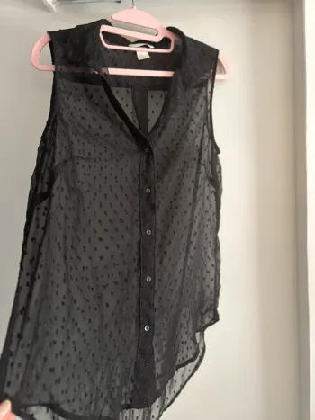 Jolie blouse noir sans manches H&M taille 36-S très bon état