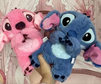 Peluche STITCH ou ANGEL 28 cm lumineuse , respire, fait plusieurs mélodies 4 modes différents NEUF