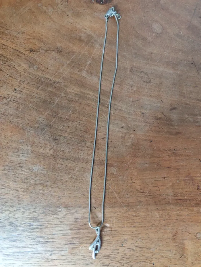 Collier avec pendentif 3 brillants