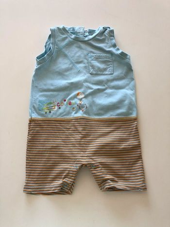 Barboteuse bleu ciel et rayé orange 12M