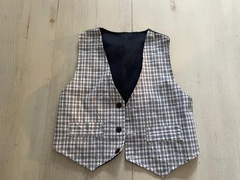 Très joli gilet sans manches occasion 4 ans