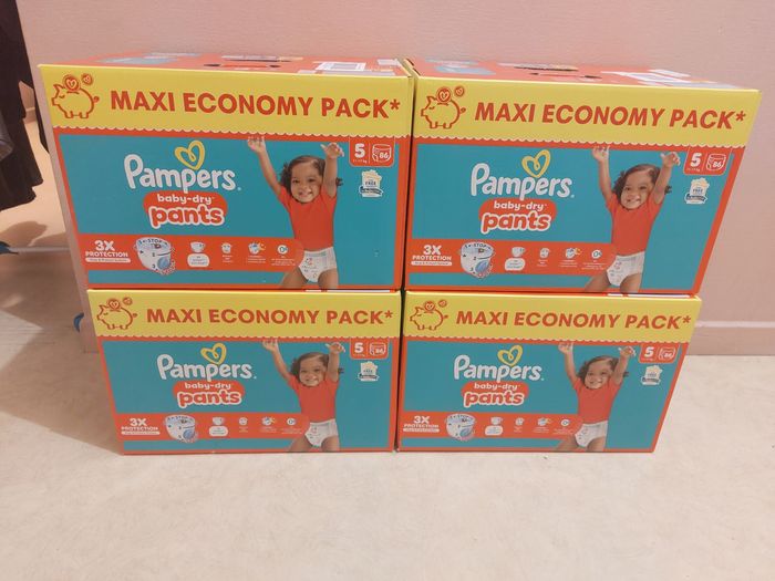 4 Maxi packs de 86 couches pampers baby dry pants taille 5